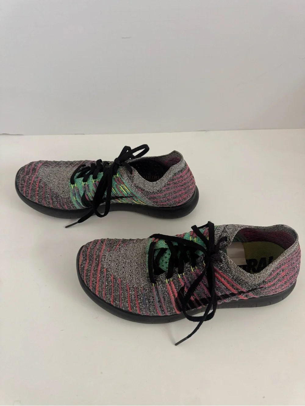 Nike Women’s Gray Knit Running Shoes with Pink and Green Accents